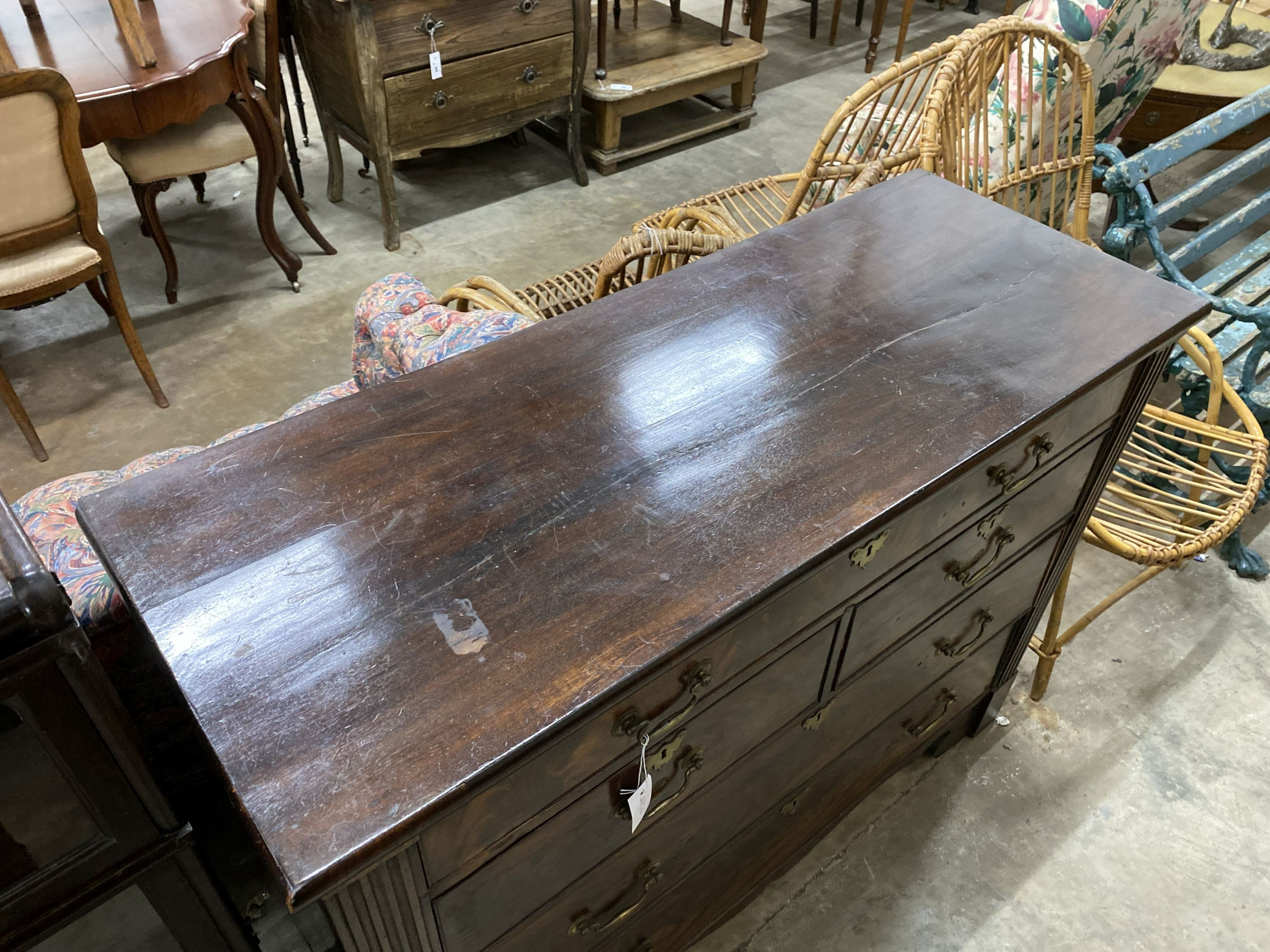 A George III mahogany chest of drawers, width 127cm, depth 49cm, height 94cm